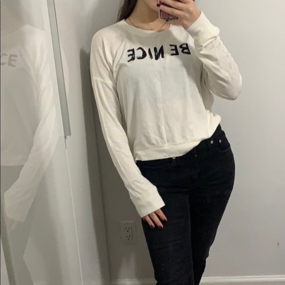 White Abercrombie & Fitch “be nice” shirt.